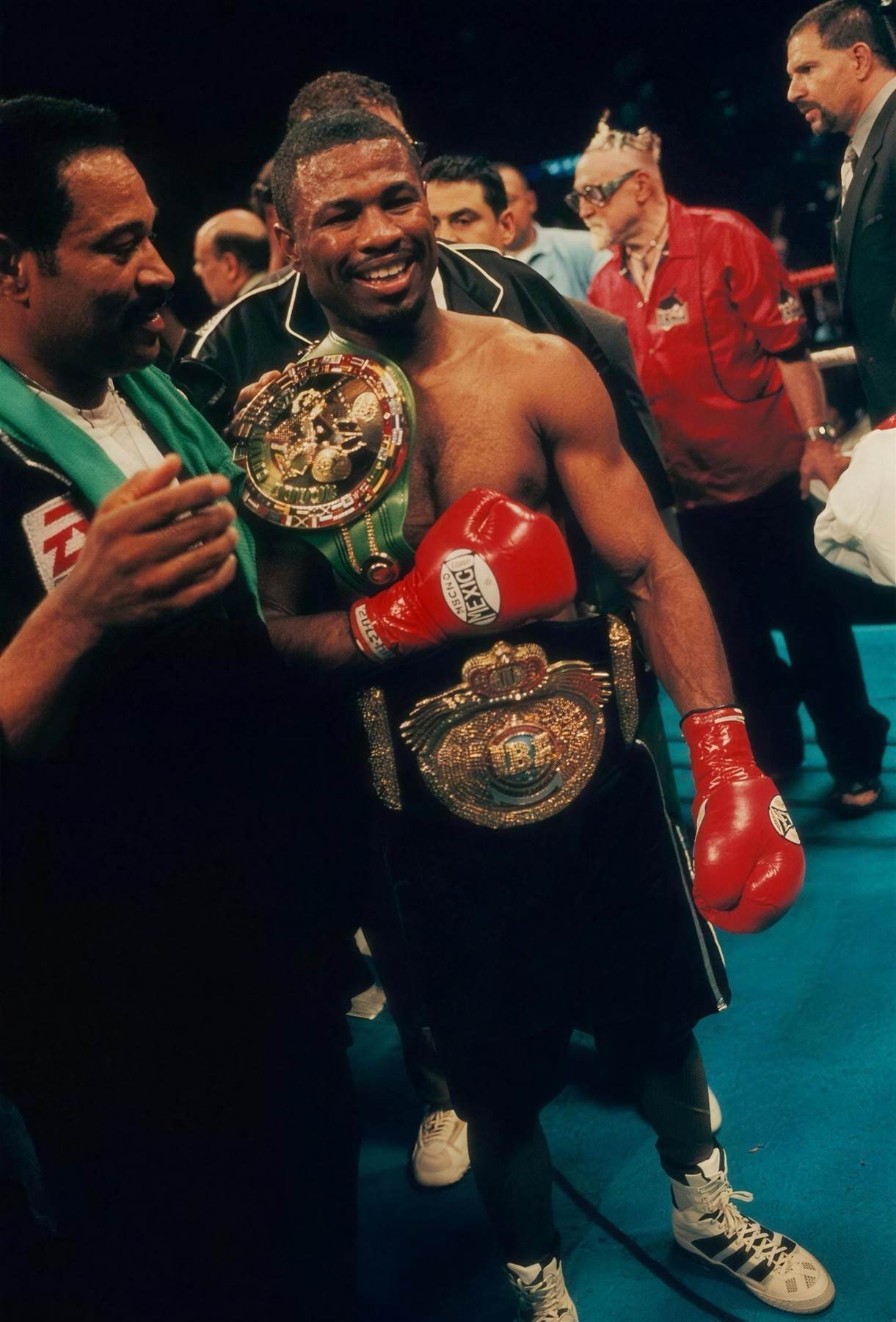 Shane Mosley with two world title belts, June 2000